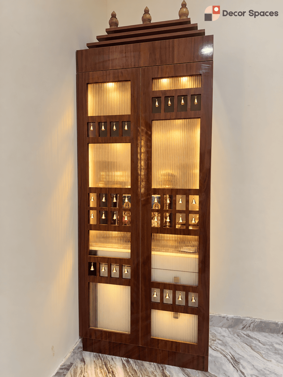 modern pooja unit completed by Decor Spaces